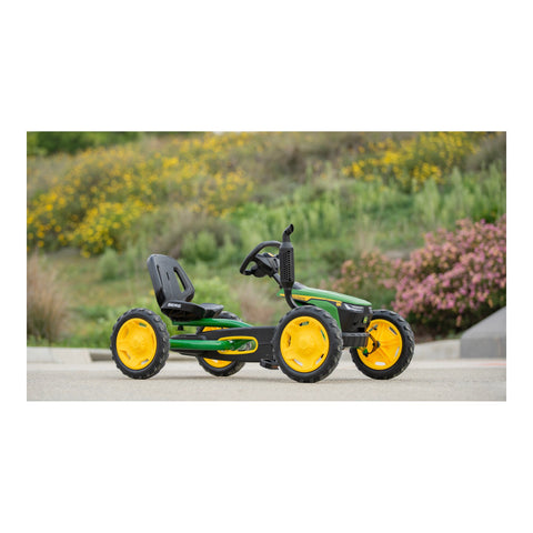 Child riding a BERG Buddy John Deere pedal kart