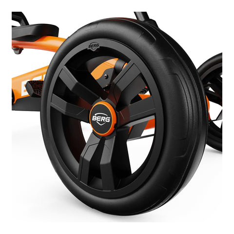 BERG Buzzy Orange pedal kart in use