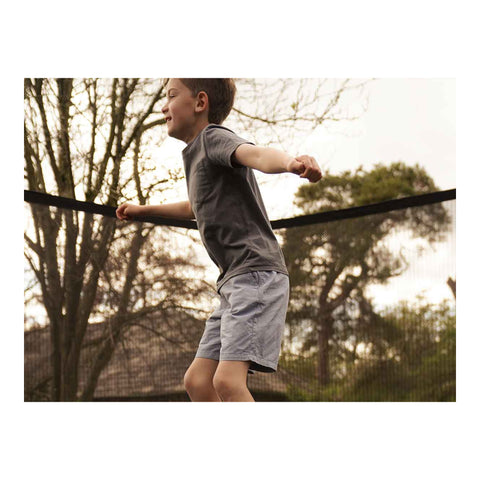 Child jumping on a North Legend trampoline