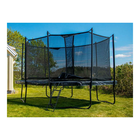 North Legend 17.5 × 12 ft rectangle trampoline in a backyard setting