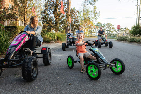 Family riding Prime pedal karts
